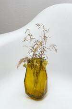 Flower vase made out of an old glass bottle