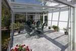Aluminum patio covers with glass