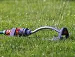 Garden hose sprinkler attachment